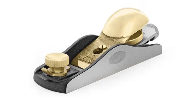 Lie-Nielsen No. 60-1/2 Low-Angle Block Plane — Editor's Choice Lie-Nielsen No. 60-1/2 low-angle block plane on a woodworking bench showing precision sole