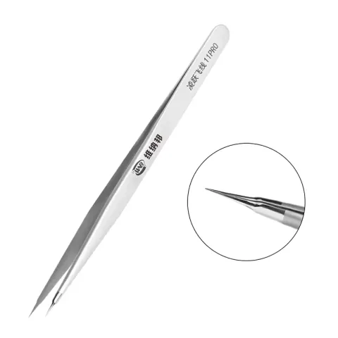 Industrial grade stainless steel precision tweezers gripping an IC component on a circuit board